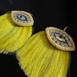 Yellow Eye Tassel Earrings